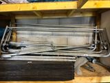a lot of pipes that are sitting on a shelf