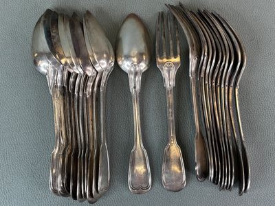 six spoons and six forks on the table