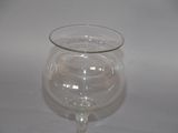 a glass that is sitting on a table