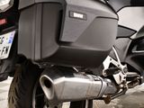 a close up of a motorcycle with a license plate on it