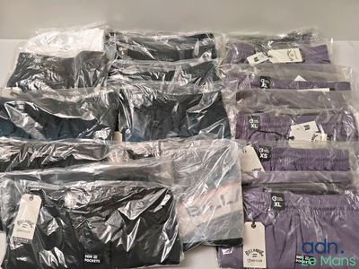 several pairs of men ' s underwear are wrapped in plastic bags