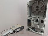 a small camera sitting on top of a glass table