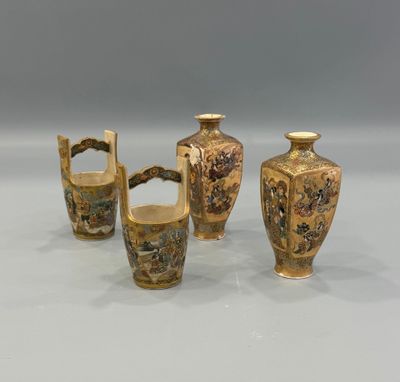 three vases with handles and handles are sitting on a table