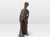 an image of a bronze statue of a woman holding a baby