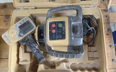 a tool in the case that is sitting on the floor