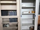 a large open cabinet in the middle of a room