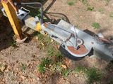 a small machine that is sitting on the ground