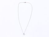 silver necklace with blue topaz stone and silver chain on white background