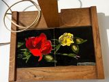 a picture of a picture of a red rose on a black background