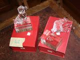 two red boxes that are sitting on a table