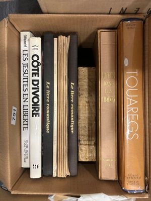 a box full of books sitting on a table