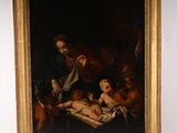 une peinture à l'huile représentant un homme tenant un bébé sur ses genoux