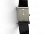 an image of a close up of a wrist watch on a white surface