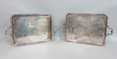 pair of silver plated trays with handles and handles