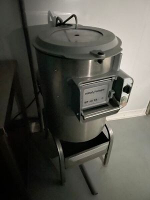 a machine that is sitting on a stand in a room