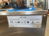 a close up of a label on a stainless steel dishwasher