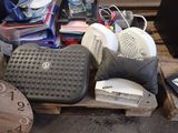 a pile of assorted items sitting on a pallet