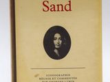 an old book with a picture of a woman on it