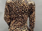 an image of a mannequin mannequin wearing a leopard print jacket