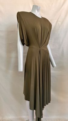 the back of a brown dress on a mannequin mannequin mannequin mannequin mannequin mannequin mannequin mannequin