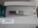 a close up of a machine with a button on it