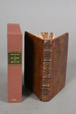 two books that are sitting next to each other on a table