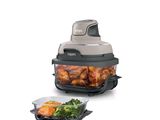 une photo d'un robot ménager contenant du poulet et du brocoli