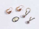 three pairs of earrings and a broochi broochi broochi broochi broochi broochi broochi broochi brooch