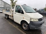 a white van that is parked on the side of the road