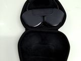 a pair of glasses sitting in a case on a table