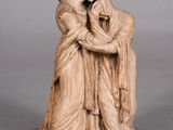 an image of a statue of a woman holding a child