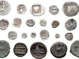 an image of a collection of ancient roman coins on a white background