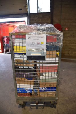 a cart that has a bunch of boxes on top of it