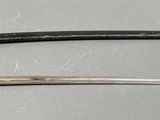 two swords that are on display on a table