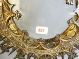 a mirror that is sitting on top of a table