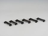 un ensemble de quatre poignées en plastique noir sur une surface blanche