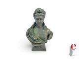statue of a woman holding a baby in her arms
