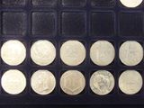 a lot of coins that are in a black box