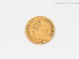 an image of a gold coin with a woman ' s head on it