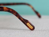 glasses on a white surface with a blue background