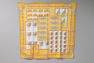 a yellow scarf with a picture of a bunch of food on it