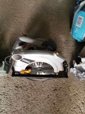 two vacuums that are sitting on the floor next to each other