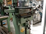 a machine that is sitting on a pallet in a warehouse