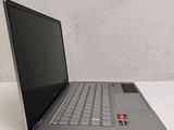 a laptop computer sitting on a table with a white background