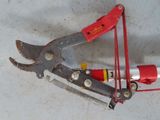 a pair of pliers that are laying on a table