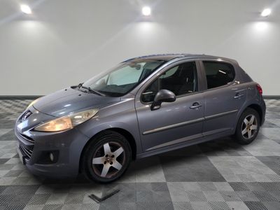 a picture of a grey car parked in a garage