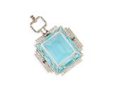 a blue topaz stone and diamond pendant on a chain
