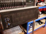 a rack with a bunch of servers on top of it