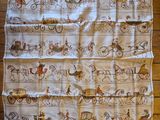 a towel with a picture of a horse drawn carriage on it