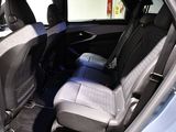 the back seats of a car are empty and the passenger seat is empty